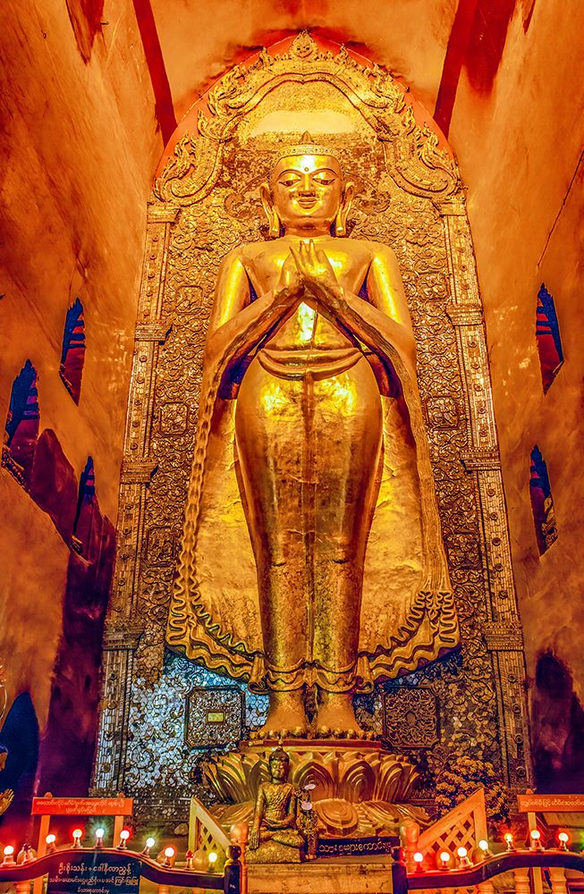 Ananda Temple, Bagan, Myanmar. Large gold Ananda Buddha statue in the shrine.